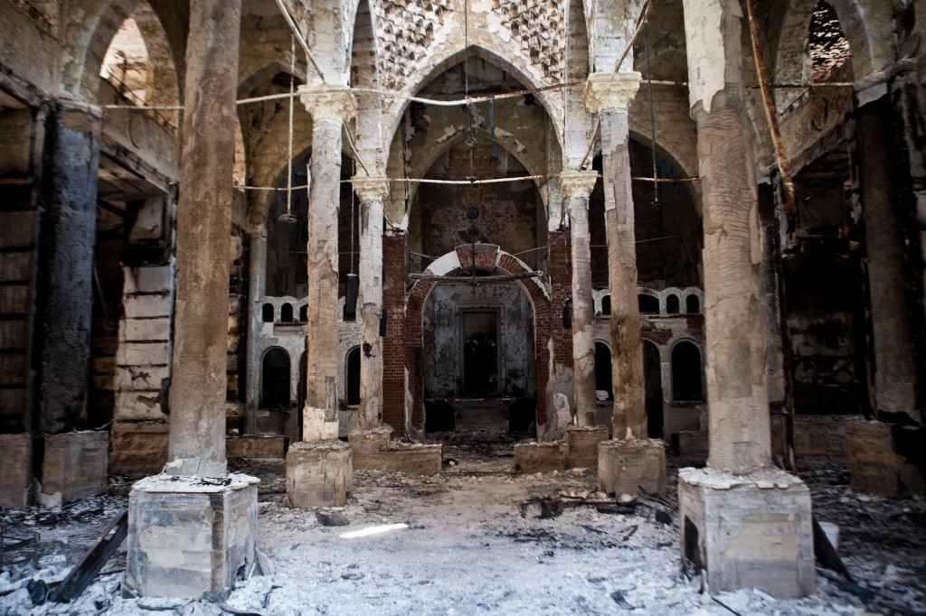 A picture taken on August 18, 2013 shows the Amir Tadros coptic Church in Minya, some 250 kms south of Cairo, which was set ablaze on August 14, 2013. Egypt's Christians are living in fear after a string of attacks against churches, businesses and homes they say were carried out by angry supporters of ousted Islamist president Mohamed Morsi. As police dispersed Morsi supporters from two Cairo squares on August 14, attackers torched churches across the country in an apparent response. AFP PHOTO / VIRGINIE NGUYEN HOANG (Photo credit should read VIRGINIE NGUYEN HOANG/AFP/Getty Images)