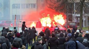 An image grab taken from an AFP video shows a van of French radio station RTL burning during clashes on the edge of a rally to denounce police brutality after a black man was allegedly sodomised with a baton during an arrest while in their custody in Paris on February 11, 2017 in Bobigny, outside Paris.<br /> A 22-year-old black youth worker named as Theo, a talented footballer with no criminal record, required surgery after his arrest on February 2, 2017 when he claims a police officer sodomized him with his baton. One officer has been charged with rape and three others with assault over the incident in the tough northeastern suburb of Aulnay-sous-Bois which has revived past controversies over alleged police brutality. / AFP PHOTO / Gregoire HOZAN